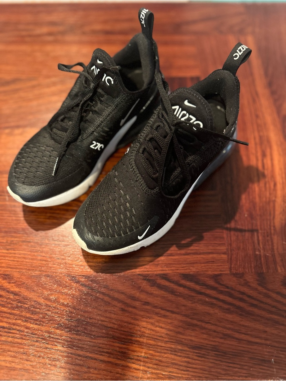 Nike Black Sneakers with White Swoosh